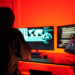 Hackers work secretly in secret rooms. Mysterious colored lights Breaking into personal security and various agencies in the world . Wanted Hacker using computer for hacking in the cyber data center .